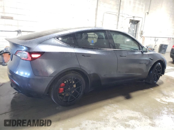 2021 Tesla Model Y Performance with VIN 5YJYGDEF2MF134700, listed as a Copart auction lot 56325685 with 66,730 mi miles and Salvage Title. Bid and sale history available at DreamBid. Image 3.
