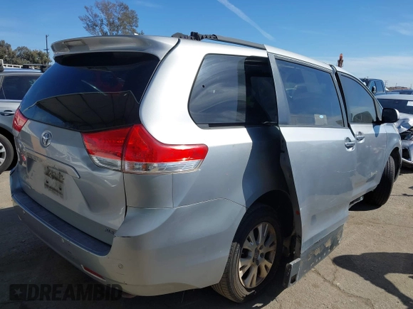 2011 Toyota Sienna XLE AAS with VIN 5TDYK3DC0BS107522, listed as a IAAI auction lot 41722324 with 171,855 mi miles and . Bid and sale history available at DreamBid. Image 4.