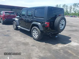 2023 Jeep Wrangler Sport S with VIN 1C4HJXDN5PW671167, listed as a IAAI auction lot 42176127 with 1,230 mi miles and . Bid and sale history available at DreamBid. Image 3.