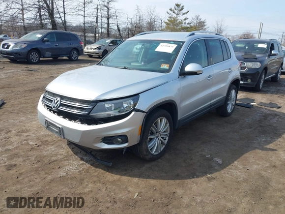 2012 Volkswagen Tiguan S z VIN WVGBV7AX9CW571627, wystawiony jako IAAI lot #41710871 z przebiegiem 157 998 mil mil oraz . Historia ofert i sprzedaży dostępna na DreamBid. Obrazek 2.