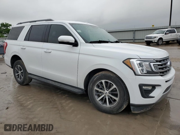 2019 Ford Expedition XLT with VIN 1FMJU1HTXKEA39774, listed as a Copart auction lot 51450225 with 98,790 mi miles and Salvage Title. Bid and sale history available at carsss.com. Image 4.