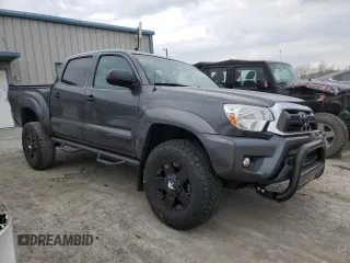 2014 Toyota Tacoma with VIN 3TMLU4EN7EM146056, listed as a Copart auction lot 54554255 with 116,035 mi miles and Salvage Title. Bid and sale history available at DreamBid. Image 4.