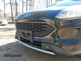 2020 Ford Escape SE z VIN 1FMCU0G6XLUA07056, wystawiony jako IAAI lot #41156940 z przebiegiem 103 707 mil mil oraz . Historia ofert i sprzedaży dostępna na DreamBid. Obrazek 19.