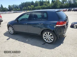 2013 Volkswagen Golf TDI w/Sunroof & Nav with VIN WVWNM7AJ0DW132074, listed as a Copart auction lot 64827005 with 141,056 mi miles and Salvage title. Bid and sale history available at DreamBid. Image 2.