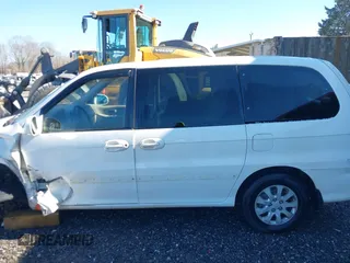 2004 Kia Sedona LX with VIN KNDUP131046577380, listed as a IAAI auction lot 41468710 with 138,451 mi miles and . Bid and sale history available at DreamBid. Image 14.