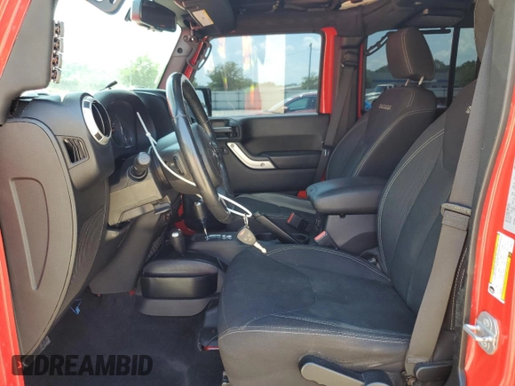 2018 Jeep Wrangler Unlimited Sahara with VIN 1C4BJWEG4JL802145, listed as a Copart auction lot 61931555 with 119,681 mi miles and Salvage title. Bid and sale history available at DreamBid. Image 7.