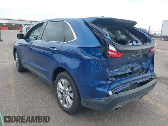 2022 Ford Edge Titanium with VIN 2FMPK4K95NBB05789, listed as a IAAI auction lot 42582372 with 58,379 mi miles and . Bid and sale history available at DreamBid. Image 3.
