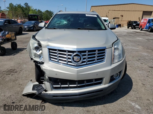 2015 Cadillac SRX Performance Collection z VIN 3GYFNCE31FS638057, wystawiony jako Copart lot #52454065 z przebiegiem 198 417 mil mil oraz Czysty tytuł • Clean title. Historia ofert i sprzedaży dostępna na DreamBid. Obrazek 5.