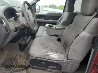 2004 Ford F-150 STX with VIN 1FTRX14W94NA19839, listed as a Copart auction lot 57643955 with 264,962 mi miles and Salvage title. Bid and sale history available at DreamBid. Image 7.