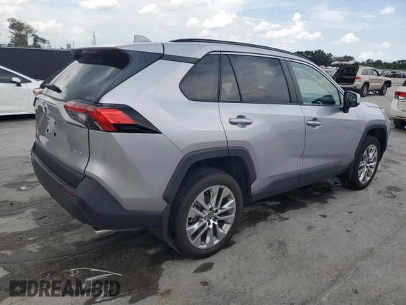 2024 Toyota RAV4 XLE Premium with VIN 2T3C1RFV7RC274727, listed as a Copart auction lot 60647645 with 21,390 mi miles and Salvage title. Bid and sale history available at DreamBid. Image 3.