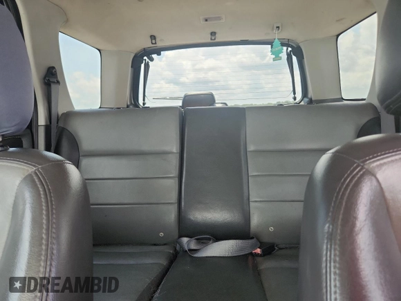 2003 Ford Escape XLT Popular with VIN 1FMYU03103KA06199, listed as a Copart auction lot 58731515 with 181,429 mi miles and Salvage title. Bid and sale history available at DreamBid. Image 10.