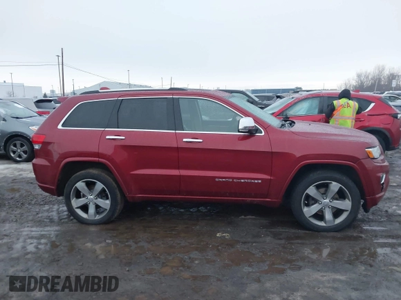 2014 Jeep Grand Cherokee Overland with VIN 1C4RJFCG9EC299235, listed as a IAAI auction lot 41670065 with 108,589 mi miles and . Bid and sale history available at DreamBid. Image 13.