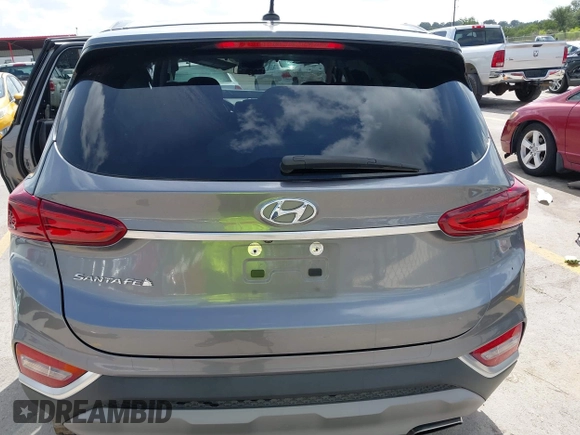 2019 Hyundai Santa Fe SE with VIN 5NMS23AD2KH108936, listed as a IAAI auction lot 42626196 with 72,757 mi miles and . Bid and sale history available at DreamBid. Image 16.