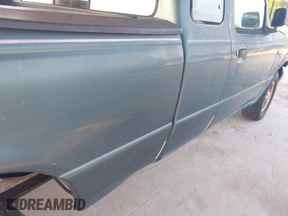 1996 Ford Ranger XL z VIN 1FTCR14AXTTA10663, wystawiony jako IAAI lot #42312413 z przebiegiem 104 211 mil mil oraz . Historia ofert i sprzedaży dostępna na DreamBid. Obrazek 13.