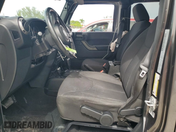 2017 Jeep Wrangler Unlimited Sport with VIN 1C4HJWDG5HL597733, listed as a Copart auction lot 59278195 with 99,156 mi miles and Salvage title. Bid and sale history available at DreamBid. Image 7.