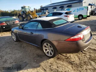 2008 Jaguar XK with VIN SAJWA44B485B23961, listed as a Copart auction lot 84052674 with 209,719 mi miles and Salvage Title. Bid and sale history available at carsss.com. Image 2.