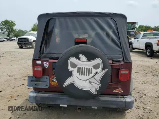 2002 Jeep Wrangler X z VIN 1J4FA39S42P773815, wystawiony jako Copart lot #60016255 z przebiegiem 174 803 mil mil oraz Szkoda całkowita • Salvage title. Historia ofert i sprzedaży dostępna na DreamBid. Obrazek 6.