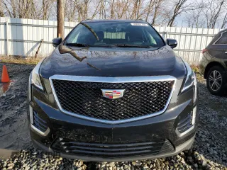 2023 Cadillac XT5 AWD Sport with VIN 1GYKNGRS6PZ131182, listed as a Copart auction lot 49907105 with 38,734 mi miles and Salvage title. Bid and sale history available at DreamBid. Image 5.