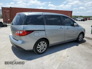 2014 Mazda 5 Sport z VIN JM1CW2BL0E0170901, wystawiony jako Copart lot #57829555 z przebiegiem 102 210 mil mil oraz Szkoda całkowita • Salvage title. Historia ofert i sprzedaży dostępna na DreamBid. Obrazek 3.