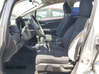2015 Honda Fit EX-L z VIN 3HGGK5H8XFM766048, wystawiony jako Copart lot #56436135 z przebiegiem 67 587 mil mil oraz Szkoda całkowita • Salvage title. Historia ofert i sprzedaży dostępna na DreamBid. Obrazek 7.