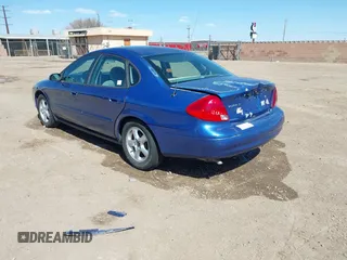 2003 Ford Taurus SE Standard with VIN 1FAFP53U23A251835, listed as a IAAI auction lot 41751323 with 119,660 mi miles. Bid and sale history available at carsss.com. Image 3.