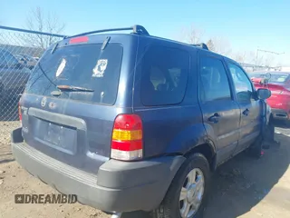 2003 Ford Escape XLT Popular with VIN 1FMYU03103KD07779, listed as a IAAI auction lot 42019919 with 245,522 mi miles. Bid and sale history available at carsss.com. Image 4.