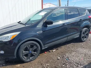 2015 Ford Escape SE z VIN 1FMCU0G73FUA15318, wystawiony jako IAAI lot #41797483 z przebiegiem 85 736 mil mil oraz . Historia ofert i sprzedaży dostępna na DreamBid. Obrazek 14.