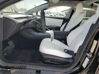 2025 Tesla Model 3 Long Range with VIN 5YJ3E1EA8SF918928, listed as a Copart auction lot 53454155 with 2,061 mi miles and Salvage title. Bid and sale history available at DreamBid. Image 7.