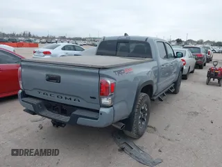 2021 Toyota Tacoma 4WD SR5 with VIN 3TMDZ5BN5MM116584, listed as a IAAI auction lot 41548175 with 23,031 mi miles. Bid and sale history available at carsss.com. Image 4.