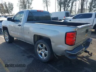 2014 Chevrolet Silverado 1500 with VIN 1GCNCREH2EZ303297, listed as a IAAI auction lot 41692877 with 115,621 mi miles and . Bid and sale history available at DreamBid. Image 3.