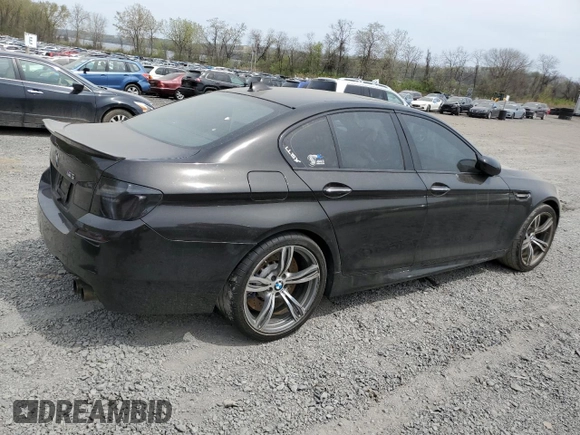 2013 BMW M5 z VIN WBSFV9C54DD095421, wystawiony jako Copart lot #53492515 z przebiegiem Nie podano mil oraz Szkoda całkowita • Salvage title. Historia ofert i sprzedaży dostępna na DreamBid. Obrazek 3.