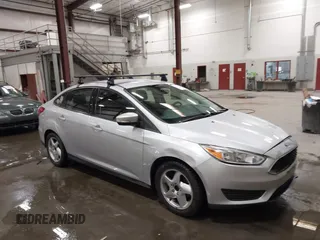 2015 Ford Focus SE with VIN 1FADP3F28FL231684, listed as a IAAI auction lot 41914284 with 100,195 mi miles. Bid and sale history available at carsss.com. Image 1.