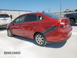 2013 Ford Fiesta SE z VIN 3FADP4BJXDM193759, wystawiony jako Copart lot #58230835 z przebiegiem 174 158 mil mil oraz Czysty tytuł • Clean title. Historia ofert i sprzedaży dostępna na DreamBid. Obrazek 2.