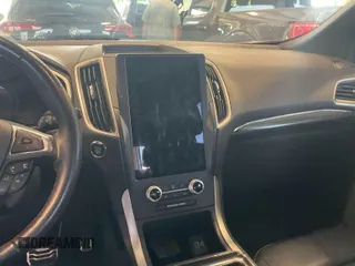 2021 Ford Edge SEL z VIN 2FMPK3J94MBA48169, wystawiony jako IAAI lot #42201573 z przebiegiem 24 155 mil mil oraz . Historia ofert i sprzedaży dostępna na DreamBid. Obrazek 1.