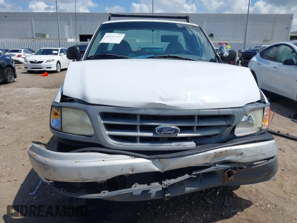 2000 Ford F-150 with VIN 1FTZF1724YKB07961, listed as a IAAI auction lot 42549926 with 186,865 mi miles and . Bid and sale history available at DreamBid. Image 12.