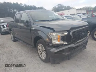 2018 Ford F-150 XL with VIN 1FTEW1C50JFD23545, listed as a IAAI auction lot 41838209 with 129,906 mi miles and . Bid and sale history available at DreamBid. Image 1.