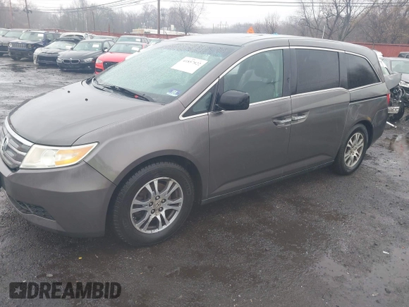2012 Honda Odyssey EX-L with VIN 5FNRL5H64CB037689, listed as a IAAI auction lot 41857822 with 121,601 mi miles and . Bid and sale history available at carsss.com. Image 18.