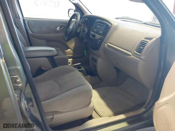 2002 Mazda Tribute LX with VIN 4F2YU08192KM65677, listed as a IAAI auction lot 41881715 with 131,837 mi miles. Bid and sale history available at carsss.com. Image 5.