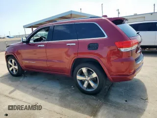 2015 Jeep Grand Cherokee Overland with VIN 1C4RJECG3FC686536, listed as a Copart auction lot 61058215 with 132,282 mi miles and Salvage title. Bid and sale history available at DreamBid. Image 2.