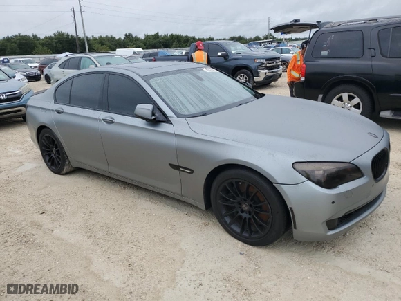 2011 BMW 7 Series 750i with VIN WBAKA8C52BCY36158, listed as a Copart auction lot 74919544 with 0 mi miles and Salvage Title. Bid and sale history available at carsss.com. Image 4.