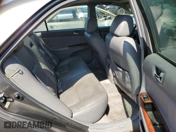 2004 Toyota Camry LE with VIN 4T1BF30K24U569209, listed as a Copart auction lot 66181644 with 186,412 mi miles and Salvage Title. Bid and sale history available at carsss.com. Image 10.