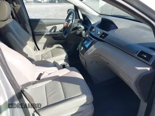 2014 Honda Odyssey EX-L with VIN 5FNRL5H61EB128311, listed as a IAAI auction lot 42334932 with 270,135 mi miles and . Bid and sale history available at DreamBid. Image 5.