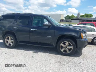 2012 Chevrolet Tahoe LT with VIN 1GNSCBE05CR211898, listed as a IAAI auction lot 42612993 with 233,367 mi miles and . Bid and sale history available at DreamBid. Image 13.