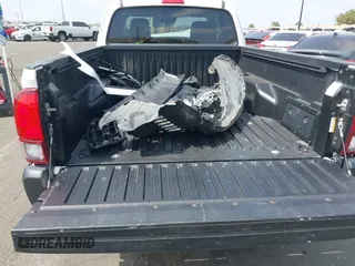 2020 Toyota Tacoma SR with VIN 3TYRX5GN0LT001284, listed as a IAAI auction lot 41888761 with 52,466 mi miles and . Bid and sale history available at DreamBid. Image 12.