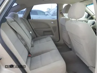 2006 Ford Five Hundred SE с VIN 1FAFP23146G150401, выставлен на аукционе Copart как лот 57000605 с пробегом 218 689 миль миль и Списание • Salvage title. История ставок и продаж доступна на DreamBid. Изображение 10.