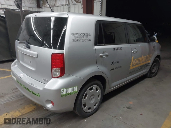 2012 Scion xB with VIN JTLZE4FE5CJ028608, listed as a IAAI auction lot 41916318 with 233,007 mi miles. Bid and sale history available at carsss.com. Image 4.