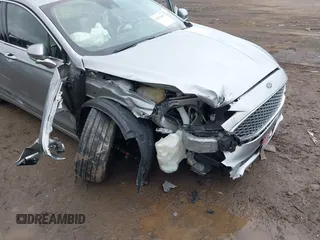 2020 Ford Fusion Titanium with VIN 3FA6P0D98LR115437, listed as a IAAI auction lot 42331052 with 127,346 mi miles and . Bid and sale history available at DreamBid. Image 6.