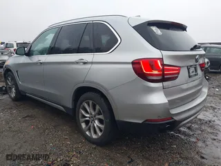 2015 BMW X5 xDrive35d with VIN 5UXKS4C51F0N06221, listed as a IAAI auction lot 41568976 with 162,442 mi miles. Bid and sale history available at carsss.com. Image 3.