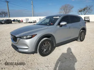 2019 Mazda CX-5 Sport with VIN JM3KFABM2K0690082, listed as a Copart auction lot 53054415 with 50,210 mi miles and Salvage Title. Bid and sale history available at DreamBid. Image 1.