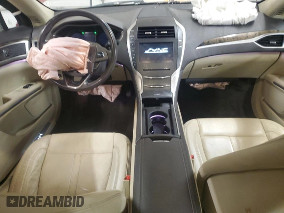 2015 Lincoln MKZ z VIN 3LN6L2J92FR624638, wystawiony jako Copart lot #57158245 z przebiegiem 150 045 mil mil oraz Szkoda całkowita • Salvage title. Historia ofert i sprzedaży dostępna na DreamBid. Obrazek 8.